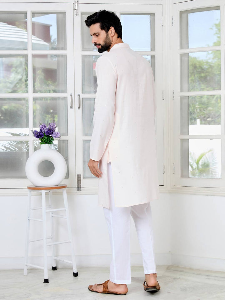 Light peach Sequins Embroidered Rayon Straight Kurta with Yoke Design Paired with Pyjama